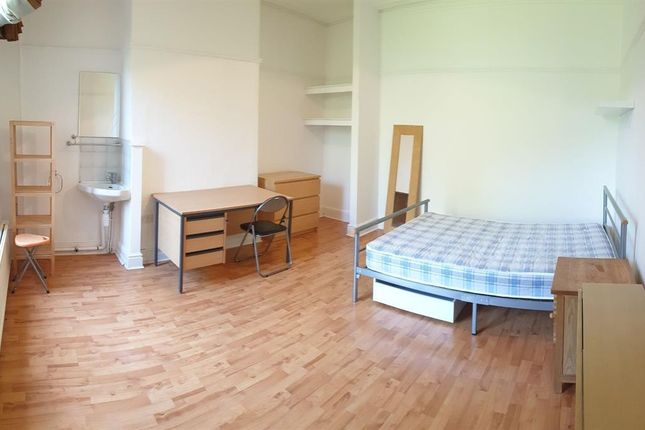 Bright And Tidy Single Bedroom Featuring A Large W...