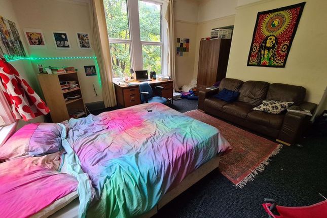 Bright And Inviting Master Bedroom Featuring A Com...