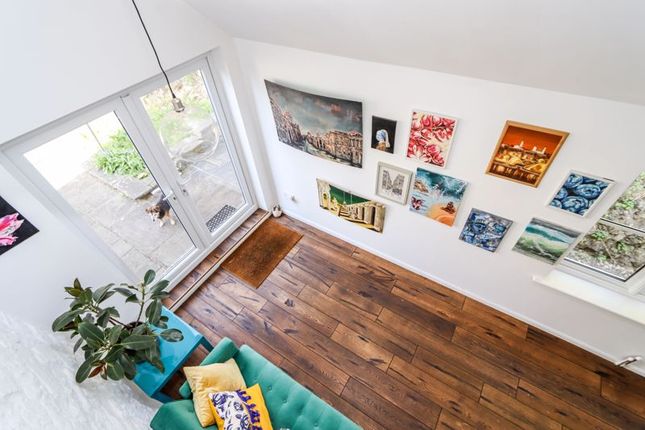 Looking Down Into Snug Room/Formal Dining Room