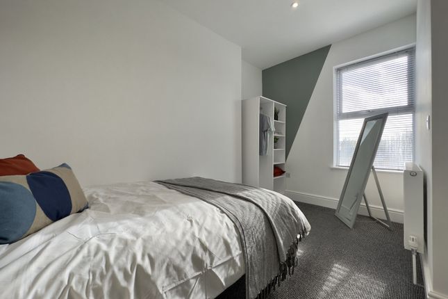A Spacious And Bright Double Bedroom Featuring Mod...