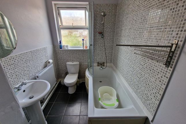 A Clean And Modern Bathroom Featuring A Full Bath ...