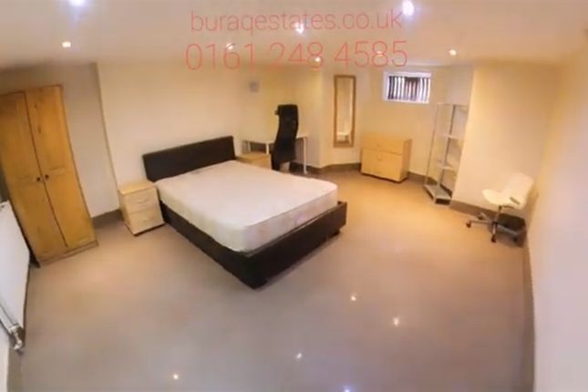 A Spacious Master Bedroom Featuring A Double Bed, ...