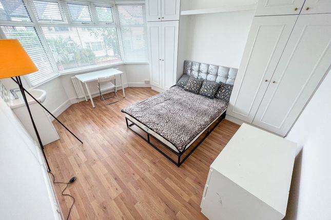 Bright And Inviting Double Bedroom Featuring A Lar...