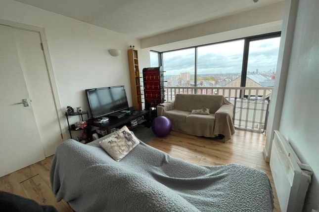 Bright Living Room With Large Floor-To-Ceiling Win...