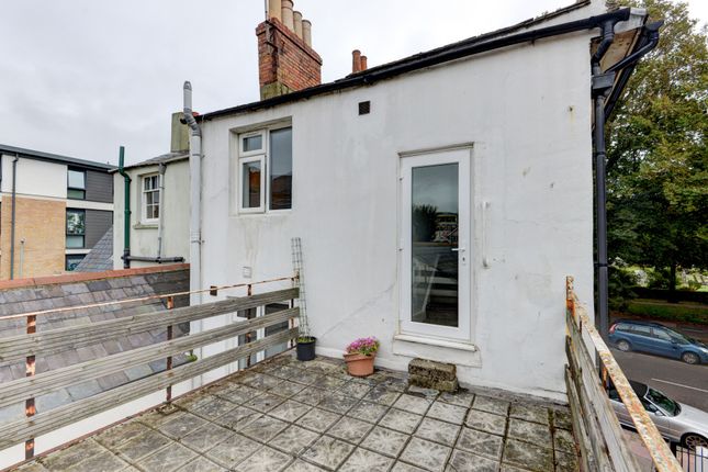 Exterior View Of A White Residential Building Show...