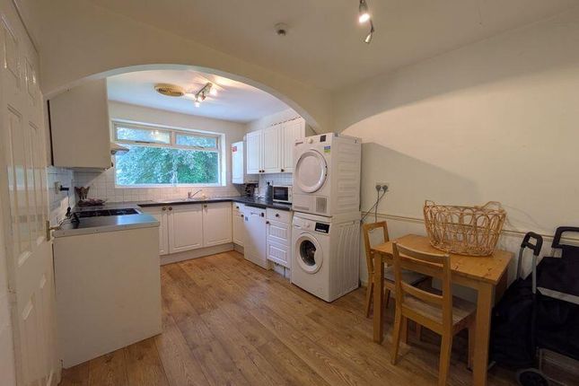 Bright And Tidy Kitchen Featuring Modern Appliance...