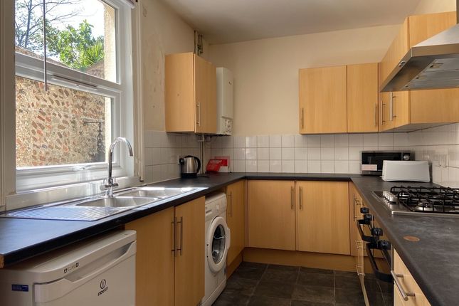 A Modern Kitchen With Ample Counter Space, Wooden ...