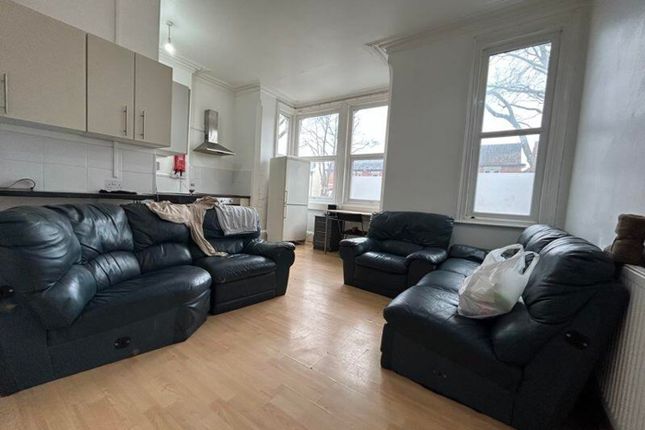 A Spacious And Inviting Large Modern Living Room W...