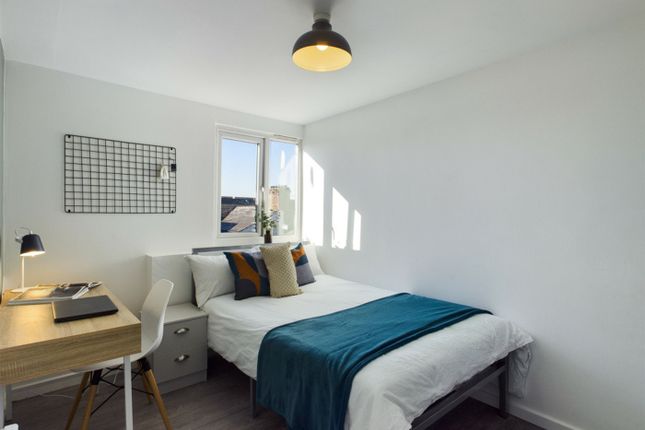 A Bright And Inviting Double Bedroom Featuring Mod...