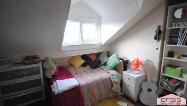 Cozy Bedroom With A Comfortable Bed And A Variety ...