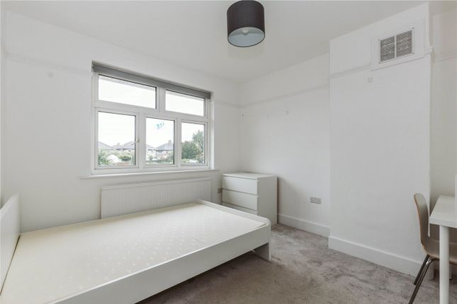 A Bright And Tidy Double Bedroom With Ample Natura...