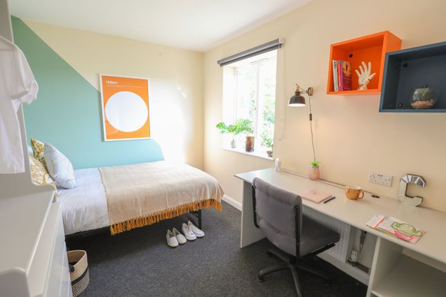 Bright And Tidy Single Bedroom Featuring A Comfort...