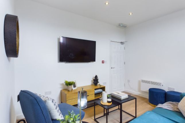 A Bright And Inviting Large Modern Living Room, Pe...