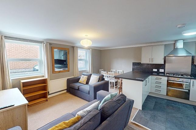 A Spacious And Inviting Large Modern Living Room F...