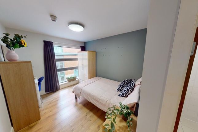 A Bright And Welcoming Master Bedroom Featuring A ...