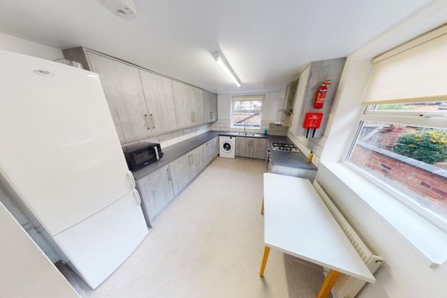 Bright And Modern Kitchen Featuring Plenty Of Cabi...