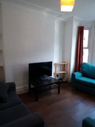A Spacious And Inviting Large Modern Living Room P...
