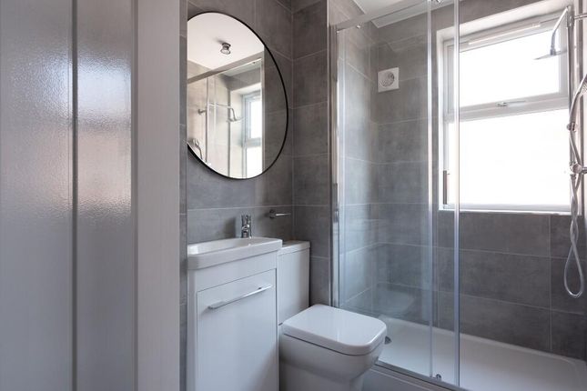 Modern, Well-Maintained Bathroom Featuring A Large...