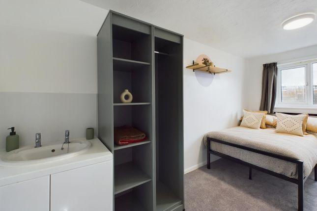 A Spacious And Well-Lit Double Bedroom Featuring m...
