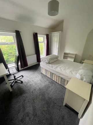 A Bright And Spacious Double Bedroom Featuring A c...