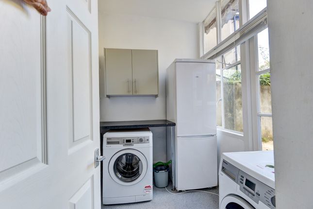 Bright And Tidy Kitchen Area With Modern Appliance...