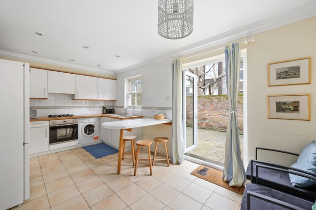 Detached house for sale in Chenies Mews, London
