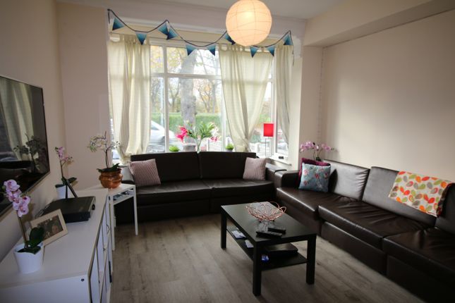 Spacious And Inviting Living Room Featuring Large ...