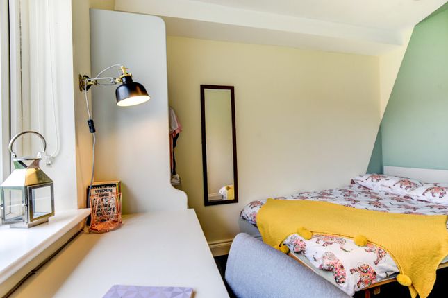 Bright And Cozy Master Bedroom Featuring A Comfort...