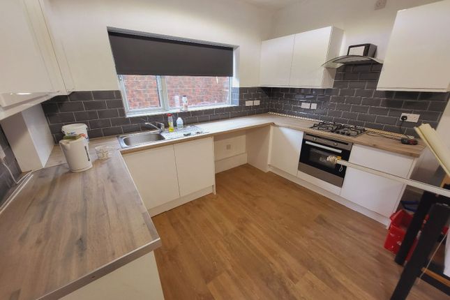 Bright And Spacious Kitchen Featuring Modern Cabin...