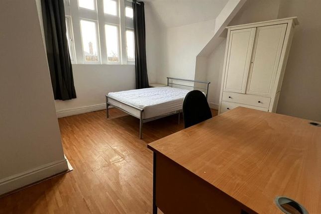 A Bright Double Bedroom Featuring A Wooden Floor, ...