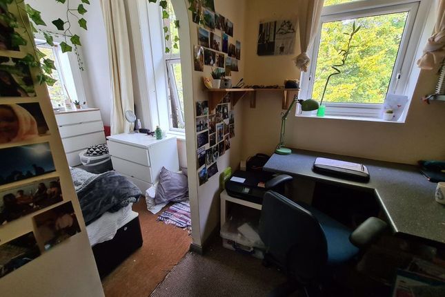 Cozy Single Bedroom With A Study Desk Positioned N...