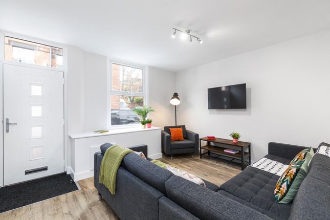 Bright, Contemporary Living Room With A Large L-Sh...