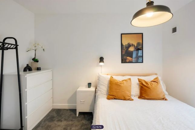 A Bright And Inviting Double Bedroom With Stylish ...