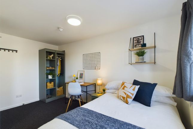 A Bright And Inviting Double Bedroom With Modern d...