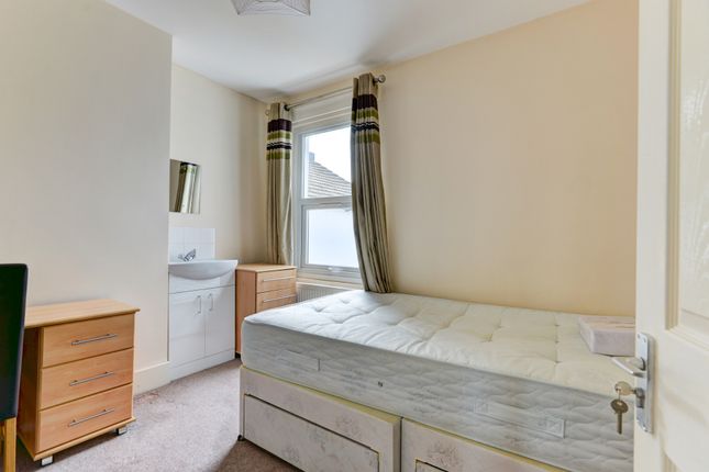 A Well-Lit Double Bedroom Featuring A Comfortable ...