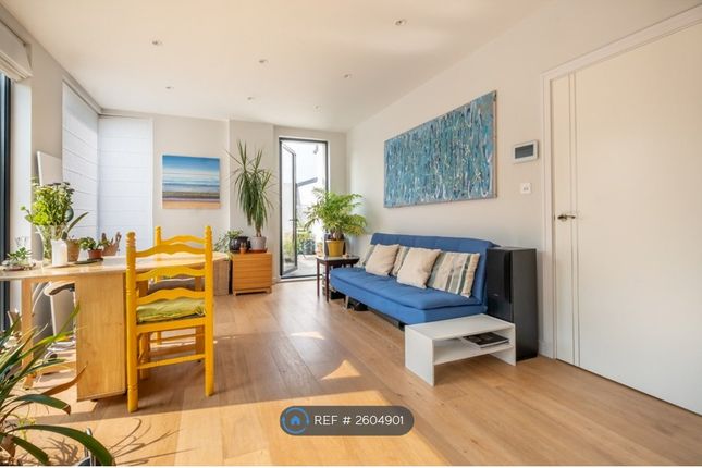 Living Room With Door To Balcony