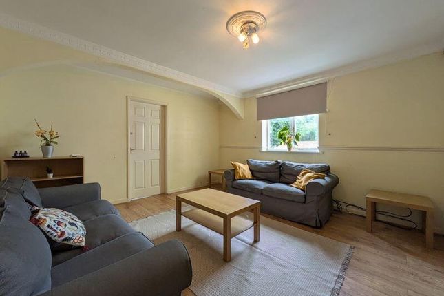 A Cozy Living Room Featuring Comfortable Sofas, A ...
