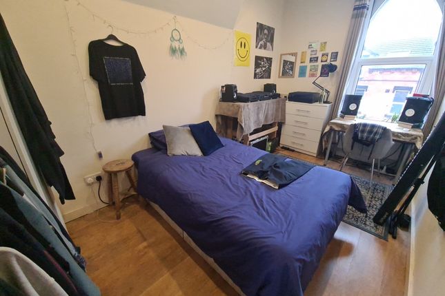 Bright And Inviting Master Bedroom Featuring A Dou...