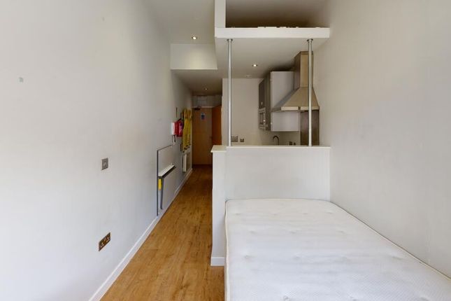 A Simple, Small Bathroom With Basic Amenities And ...