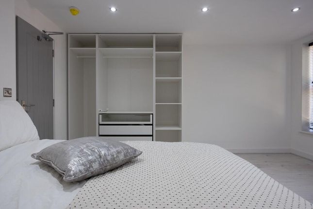 Spacious Master Bedroom Featuring A Comfortable Be...