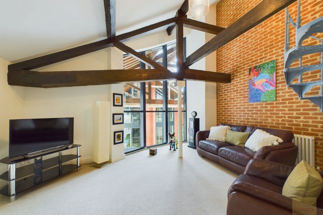 Living Room With Double Height Ceiling.