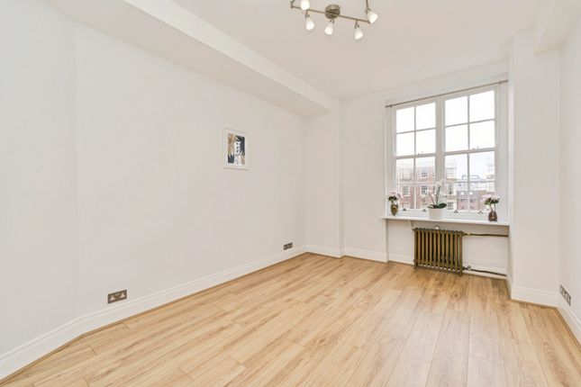 Flat 107, Queens Court, Queensway, London photo 4