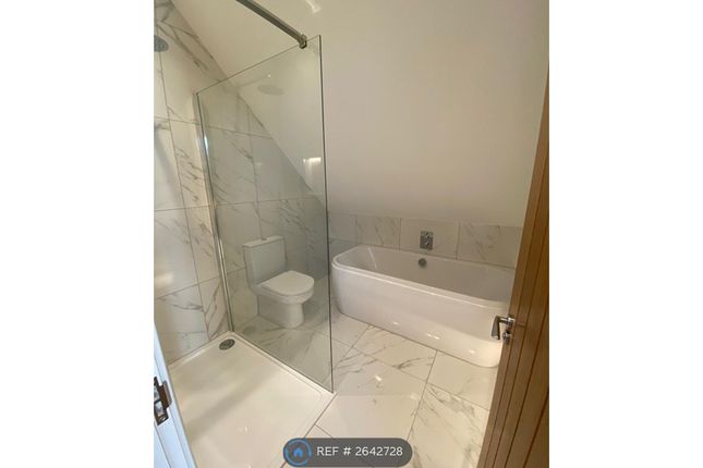 Bathroom With Shower, Bath &amp; Toilet