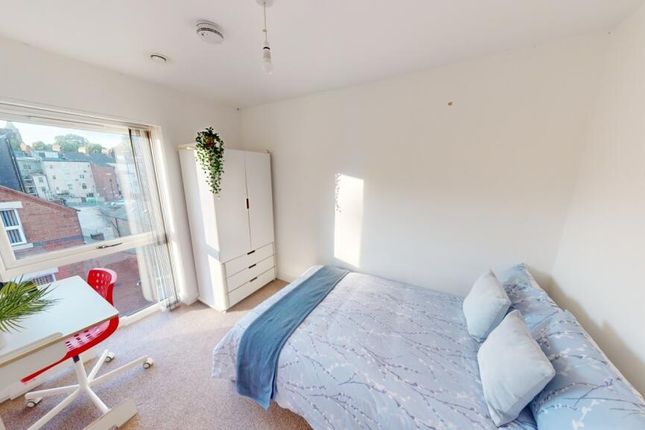 Bright And Inviting Master Bedroom Featuring A Com...