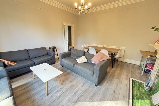 A Spacious And Well-Maintained Living Room With Mo...