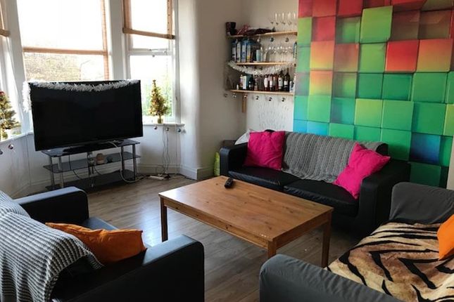 Bright, Modern Living Room With Colourful Feature ...
