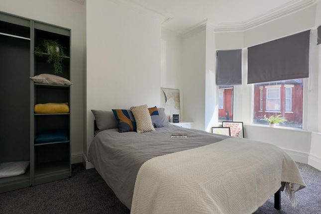 A Bright And Spacious Double Bedroom With Modern F...