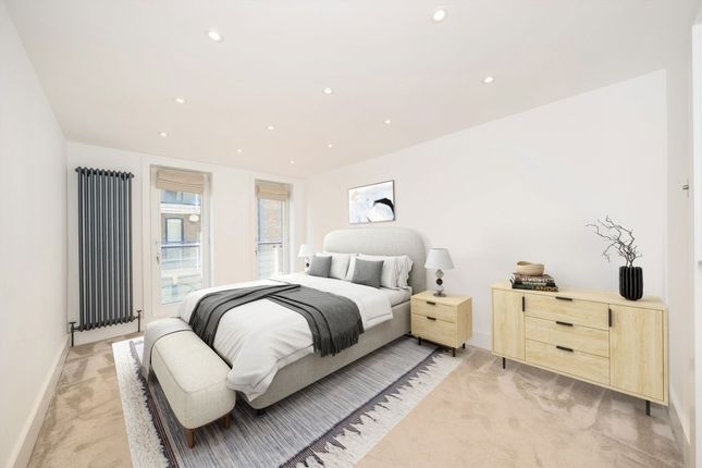 Flat 15, Calico House, Clove Hitch Quay, London photo 3