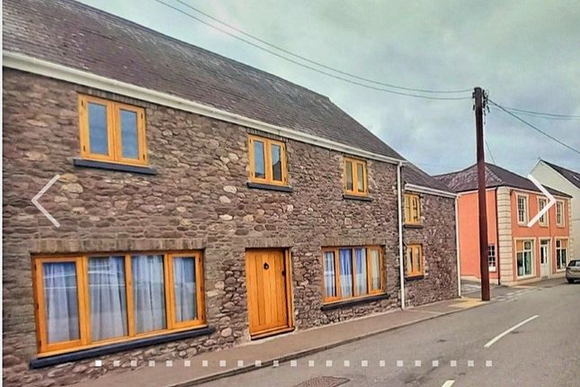 End terrace house for sale in Queens Square, Llangadog, Carmarthenshire.