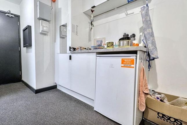 A Bright And Functional Kitchen Area With A Well-O...